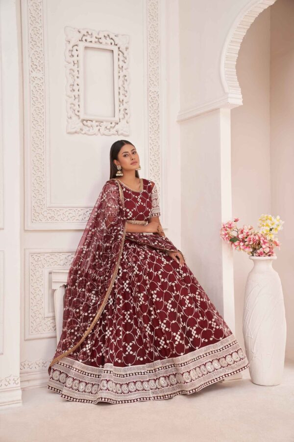 Reddish maroon net lehenga choli