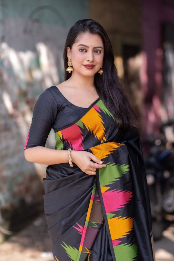 black silk saree with tassels and blouse
