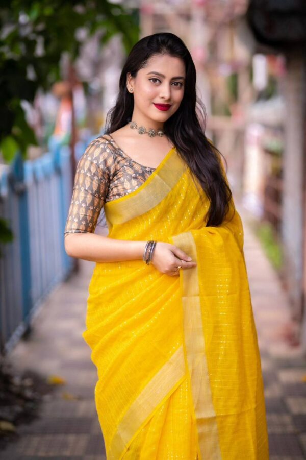 mustard yellow saree with printed blouse