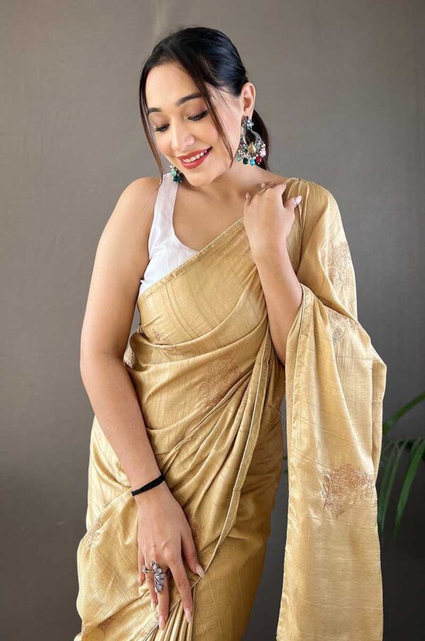 Cream Silk Saree with Zari Embroidery and Piping Design