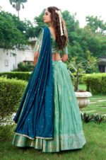 Pista-Zari-Weaving-Kanchipuram-Silk-Traditional-Lehenga-Choli-with-contrast-and-sequence-worked-Dupatta-2