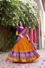 Mustard-Tussar-Silk-Patola-Print-Lehenga-Choli-with-Purple-Dupatta-2