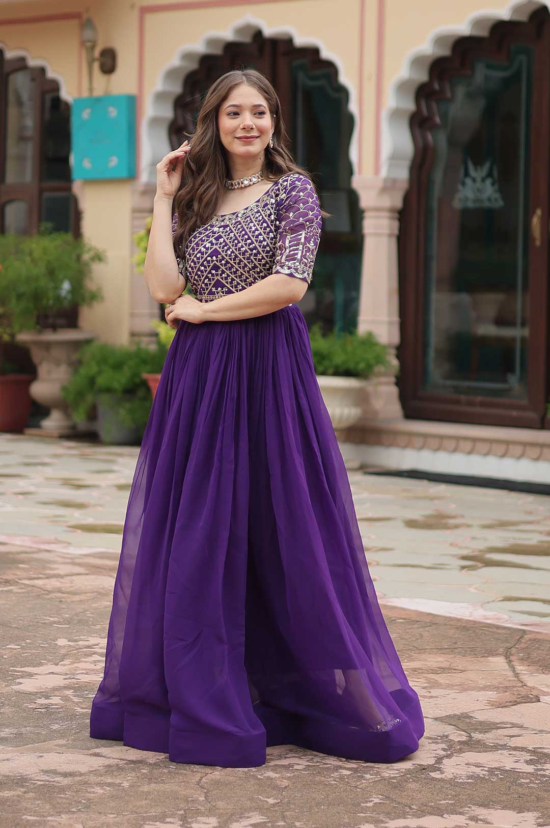 Elegant Purple Faux Blooming Gown with Zari & Sequins Work