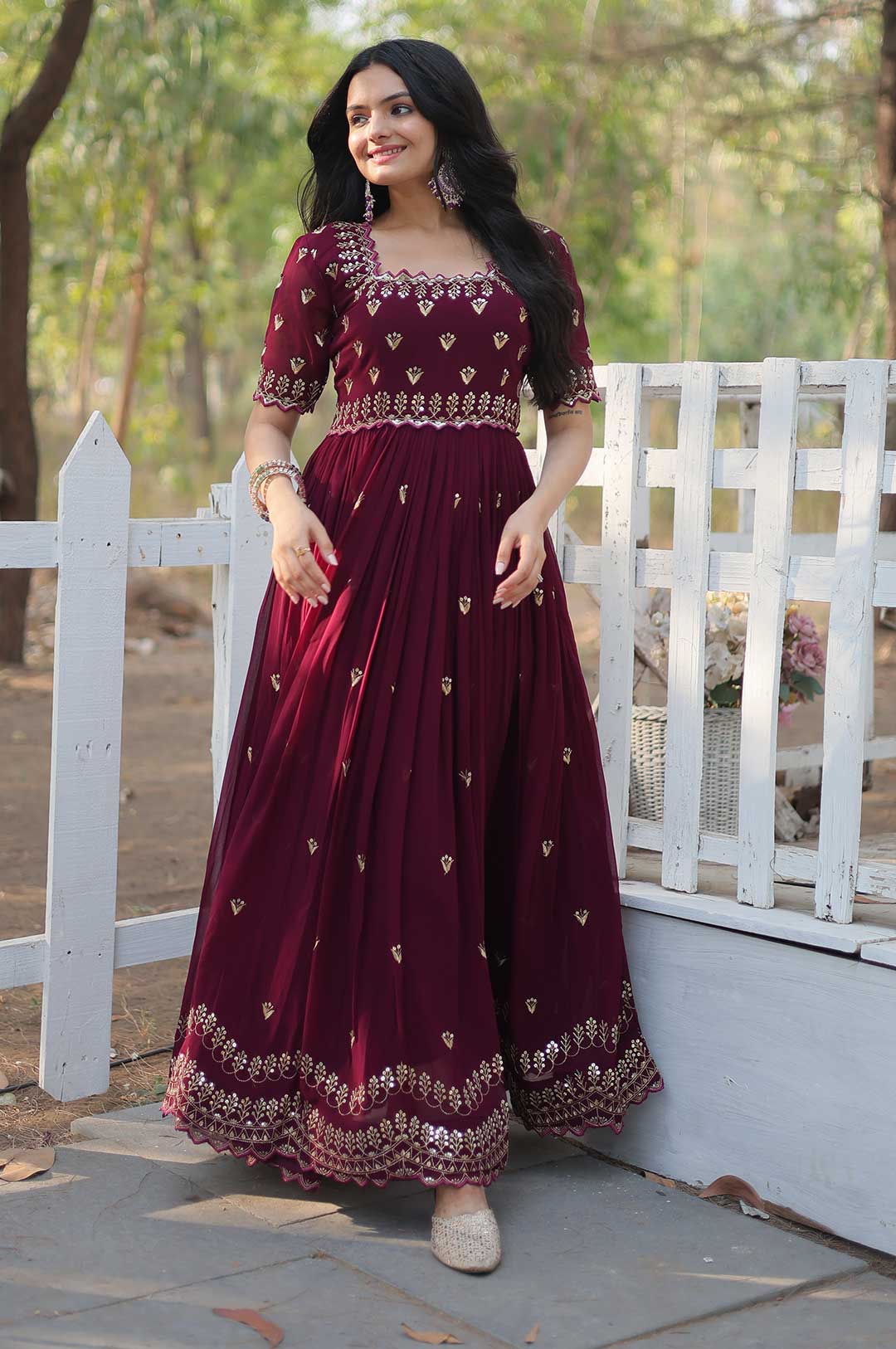 Maroon Georgette Gown with Embroidered Bodice & Gold Work Border