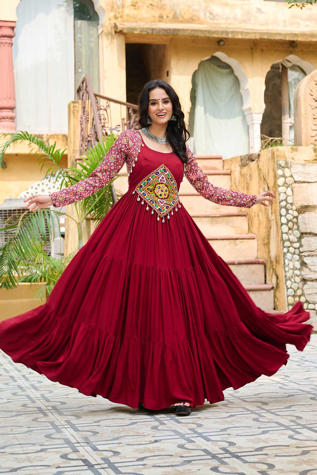Maroon Kutchi Gamthi Embroidered Reyon Gown with 12 Mtr Flair & Printed Sleeves