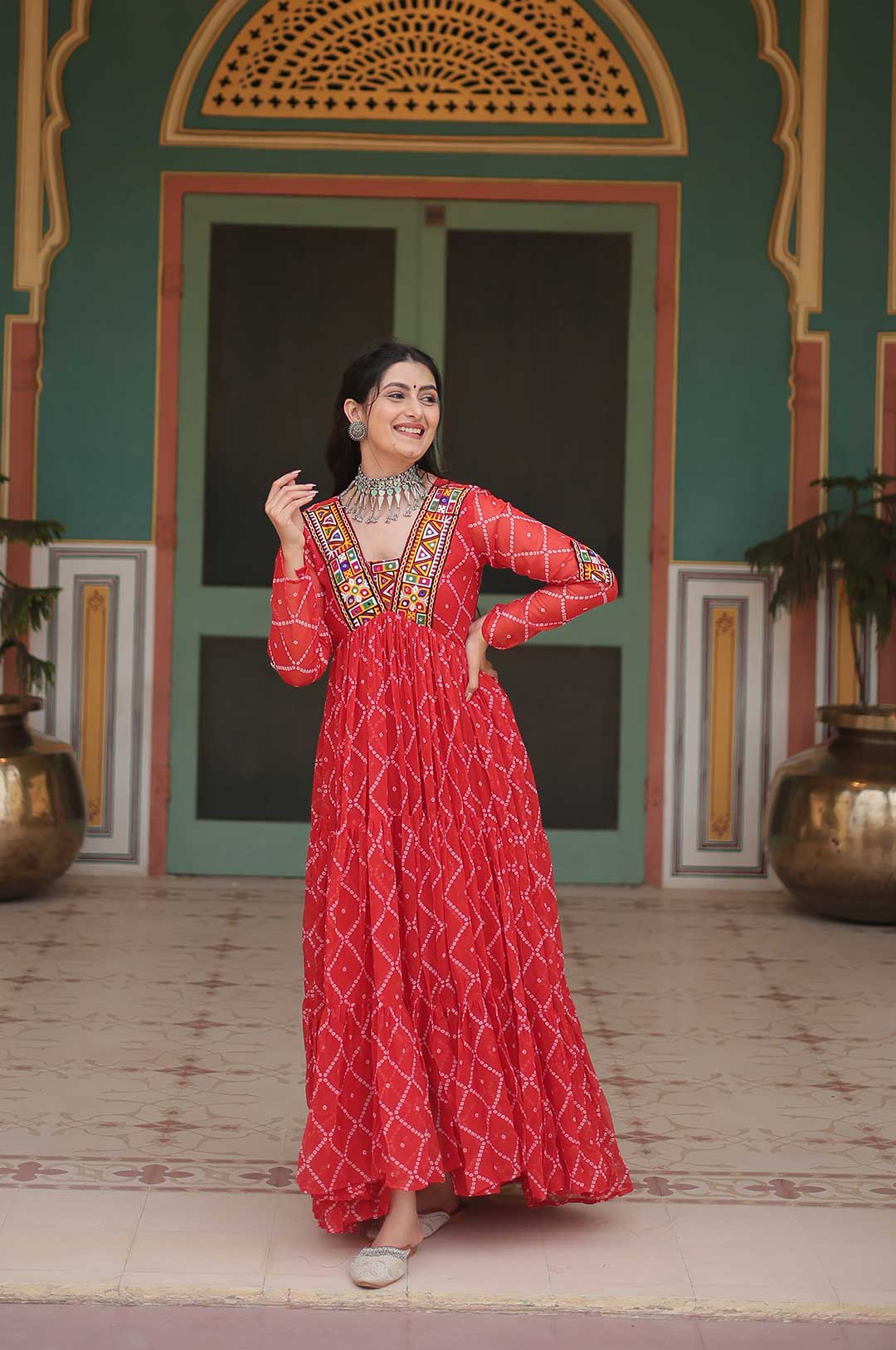 Orange Bandhani Print Georgette Gown with Embellished Yoke