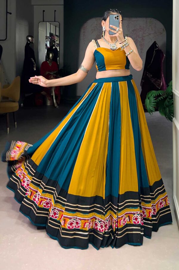 Mustard Yellow And Teal Lehenga Choli With A Printed Border