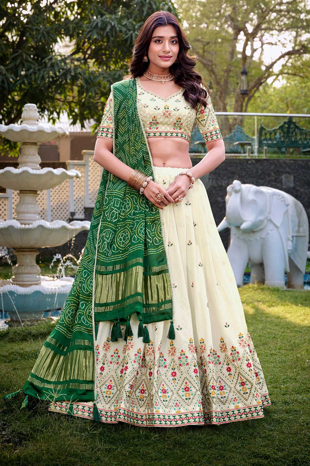 Off-White and Green Lehenga Choli with a Bandhani Dupatta